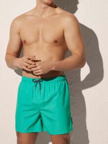 - "90271 - Medium Swimsuit Turquoise" 